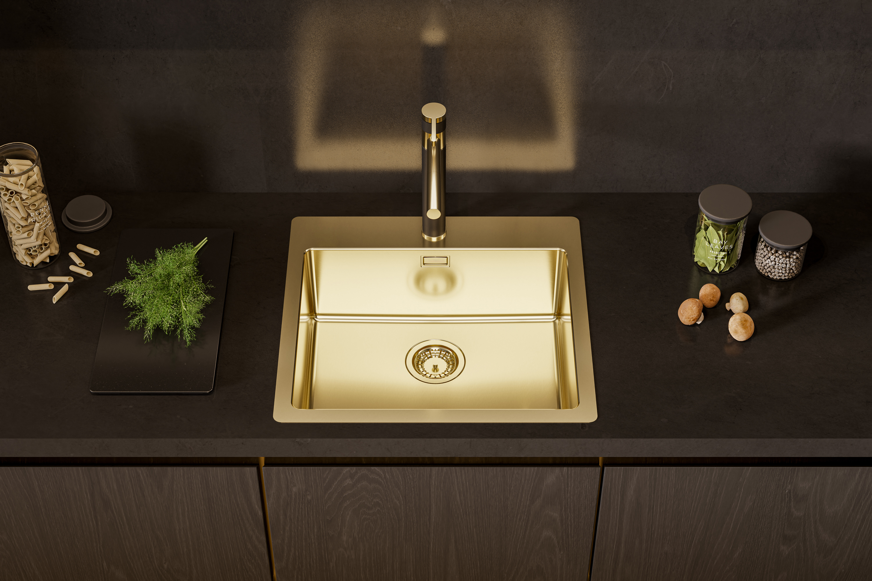 MONARCH-T50G – Gold-colored sink with a tap area